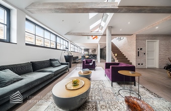 Exklusive Dachgeschosswohnung mit Terrasse in Bestlage
